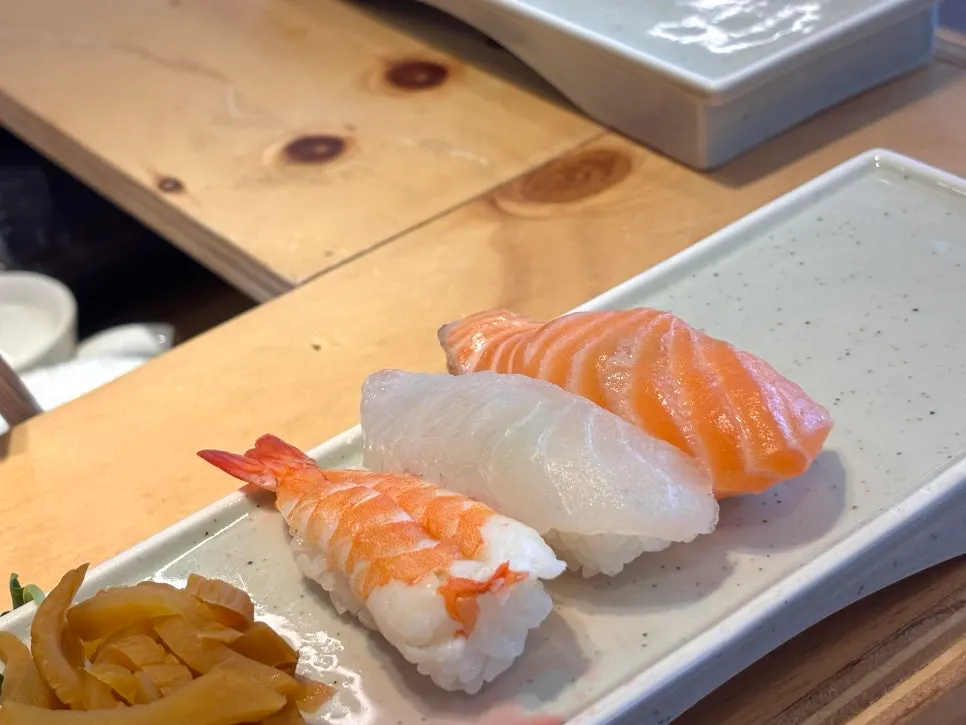 A piece of white fish sushi