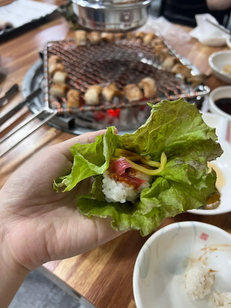 Eel wrap with aged kimchi and pickled perilla leaf