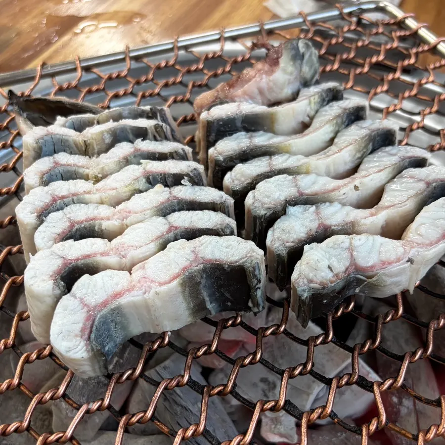 Eel placed on a charcoal grill