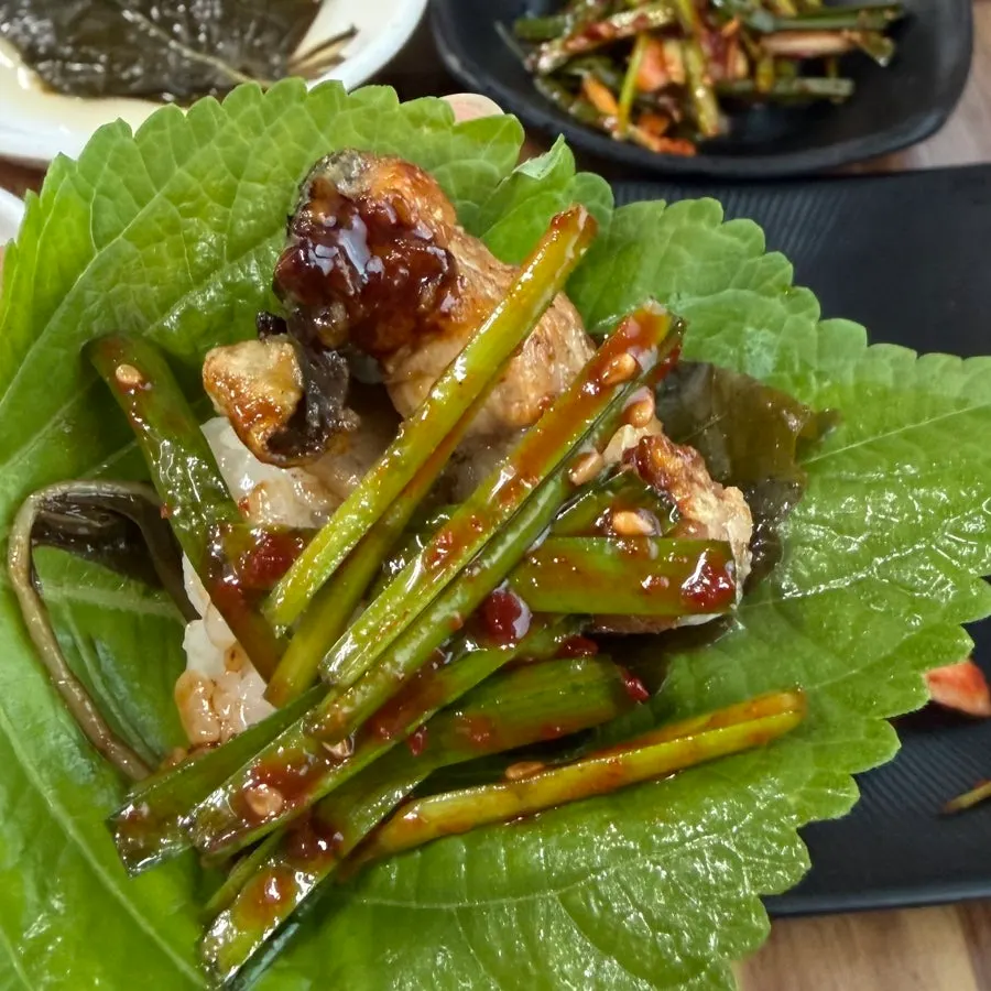 Eel ssam wrapped in a perilla leaf
