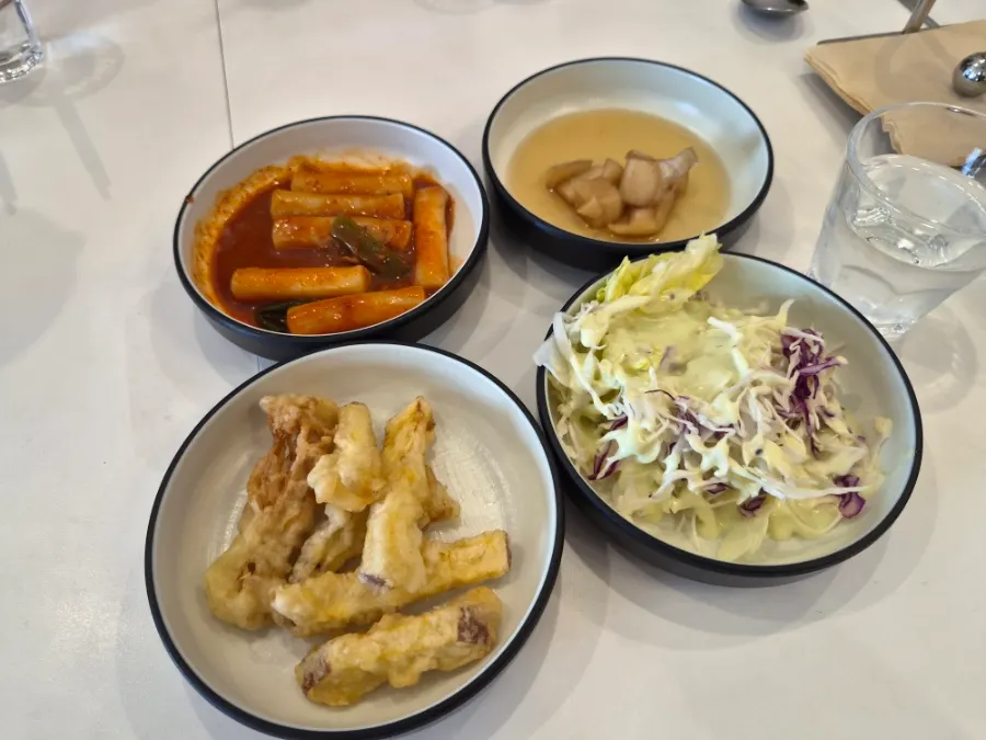 Plate of sweet potato fritters and tteokbokki