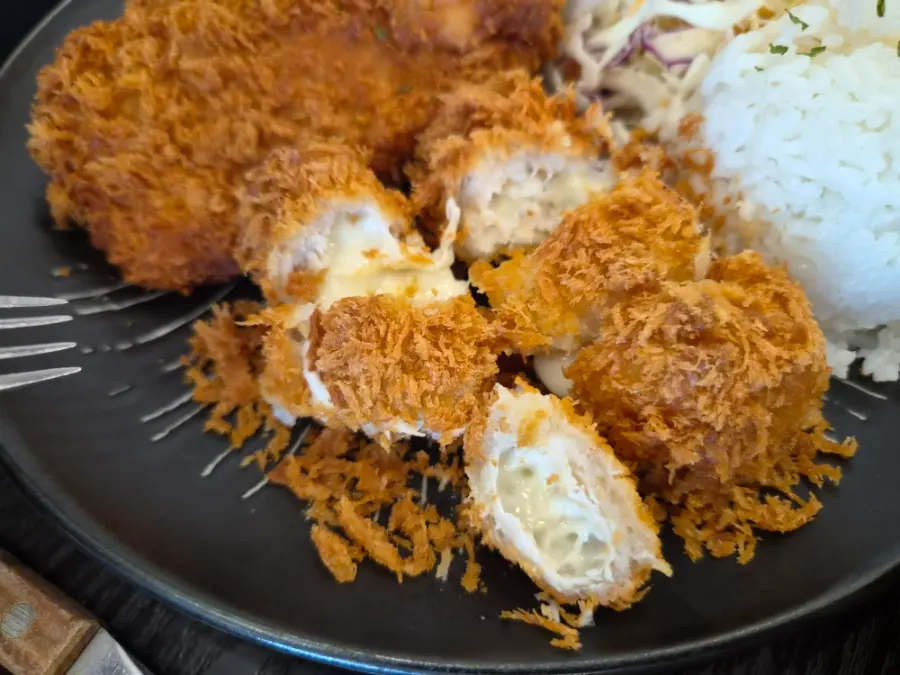 Cross-section of the cheese roll showing the melted cheese inside