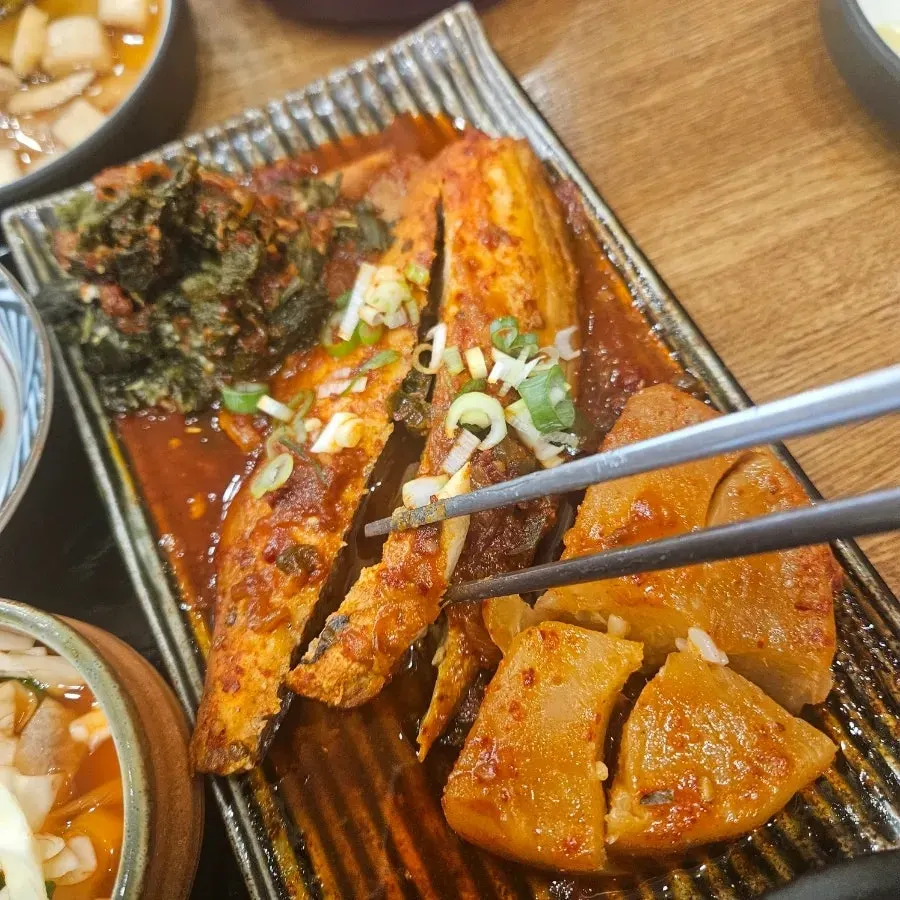 Close-up of braised mackerel with radish soaked in seasoning