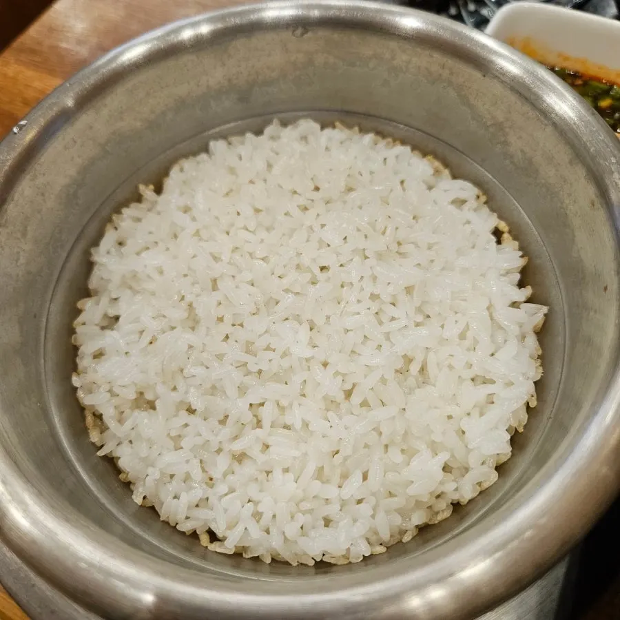 A piece of mackerel placed on top of rice