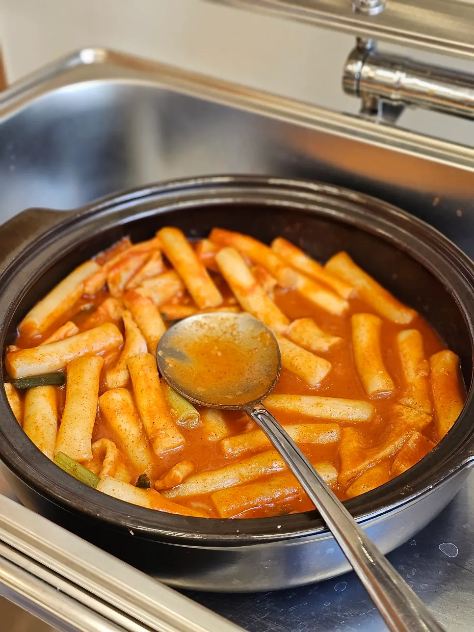 Kimchi soup and side dishes at the self-serve bar