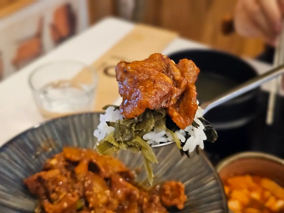 Gochujang bulgogi piled on a leafy green wrap
