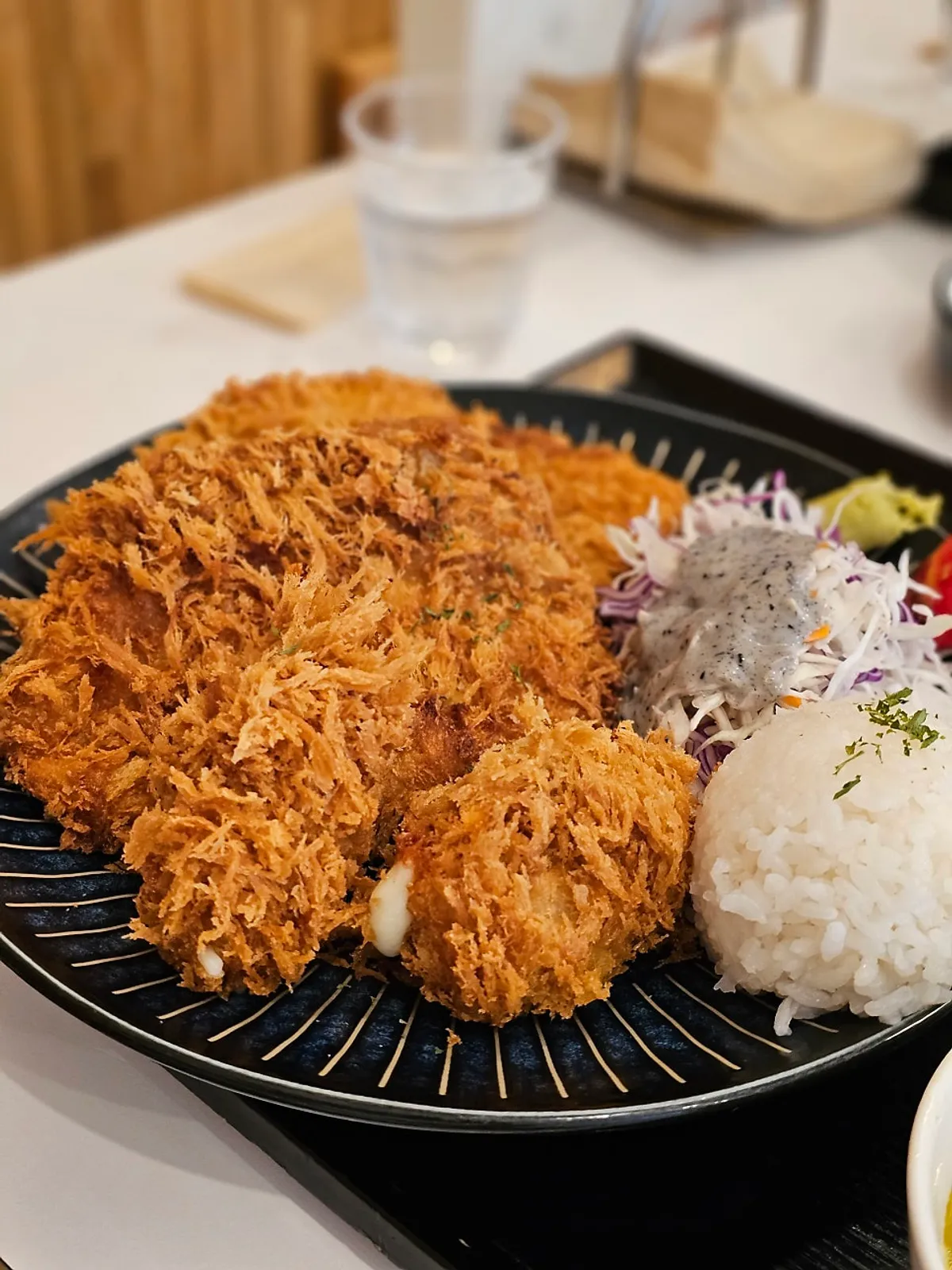 Thick, well-fried handmade pork cutlet and cheese roll