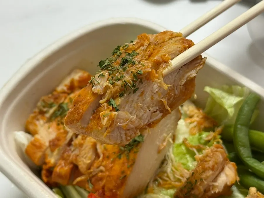 Filling chicken salad box for a meal