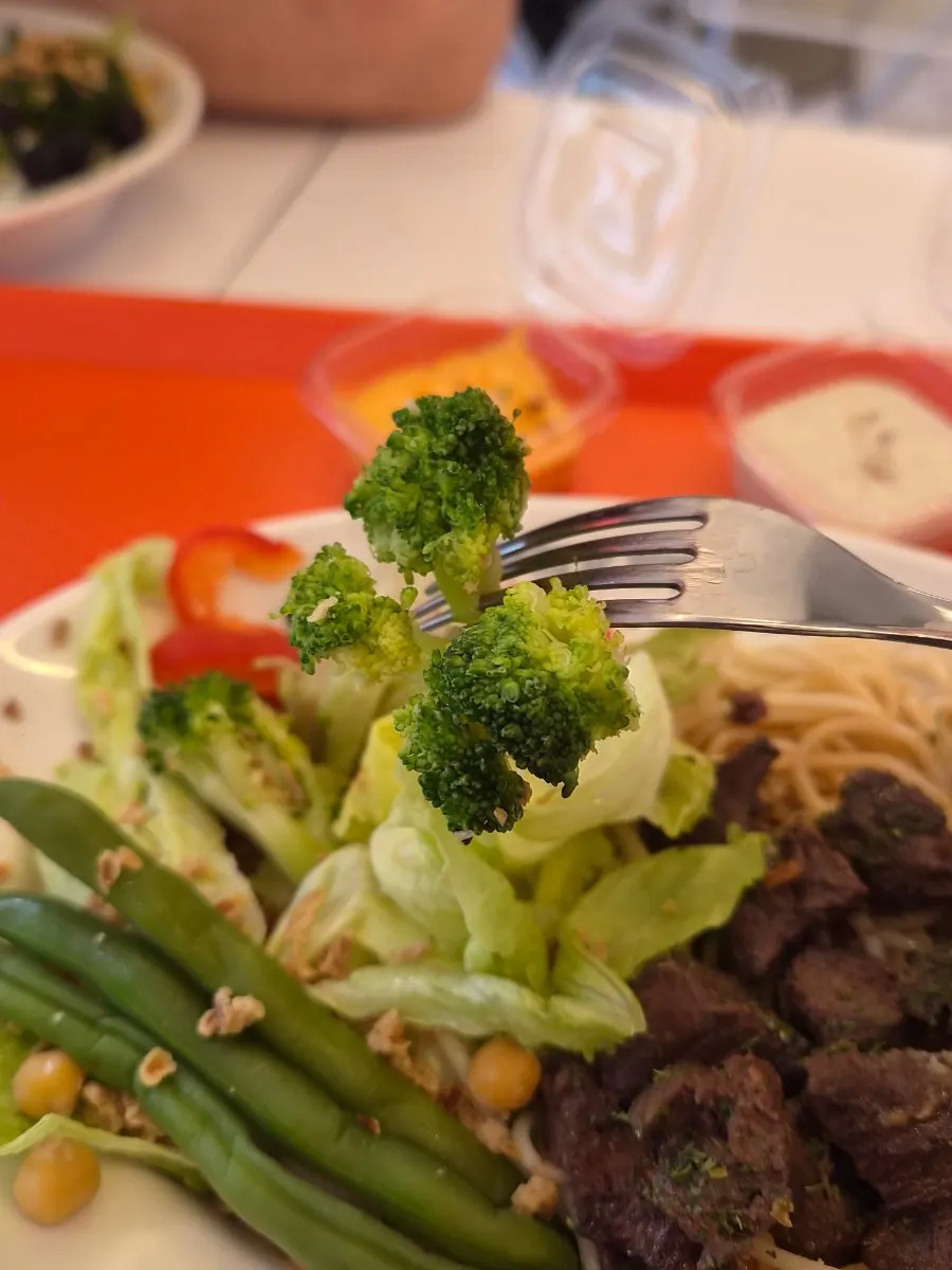 Beef salad loaded with lettuce and olives