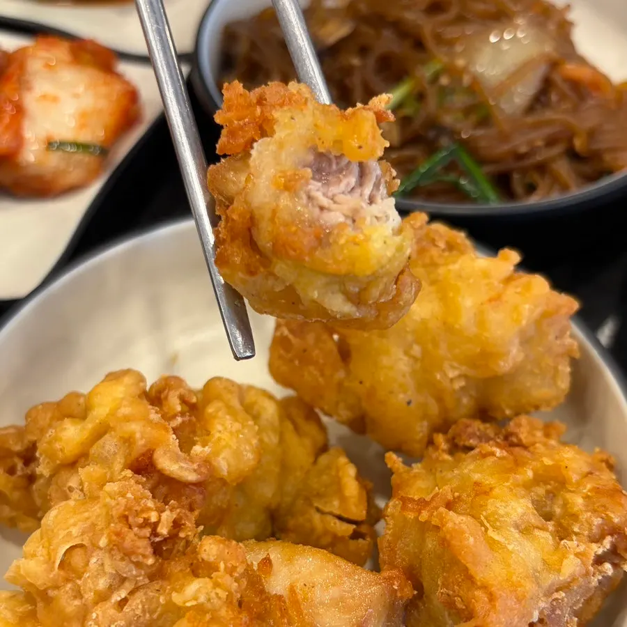 A plate of extra side dishes from the self-service bar