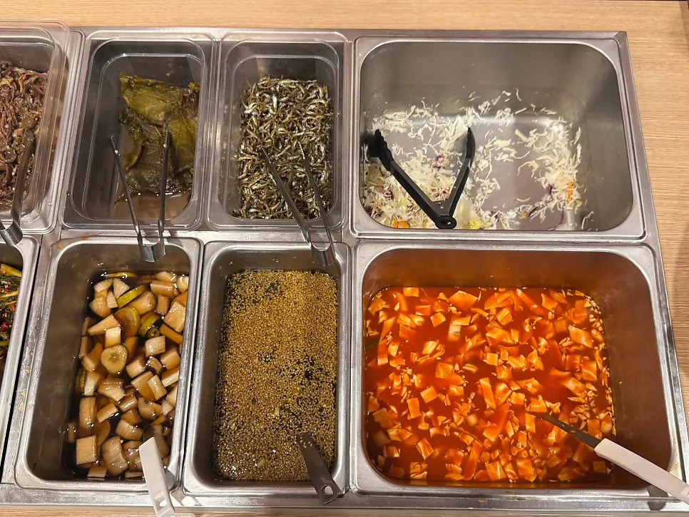 Side dishes including spicy stir-fried pork and seaweed soup