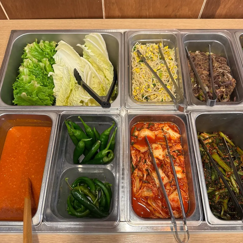 A plate filled from the salad bar