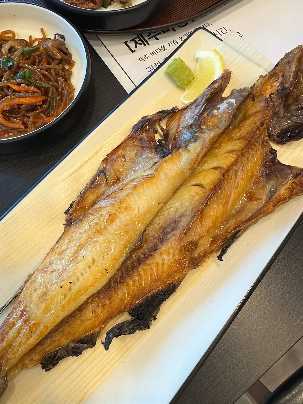 A generous plate of grilled atka mackerel