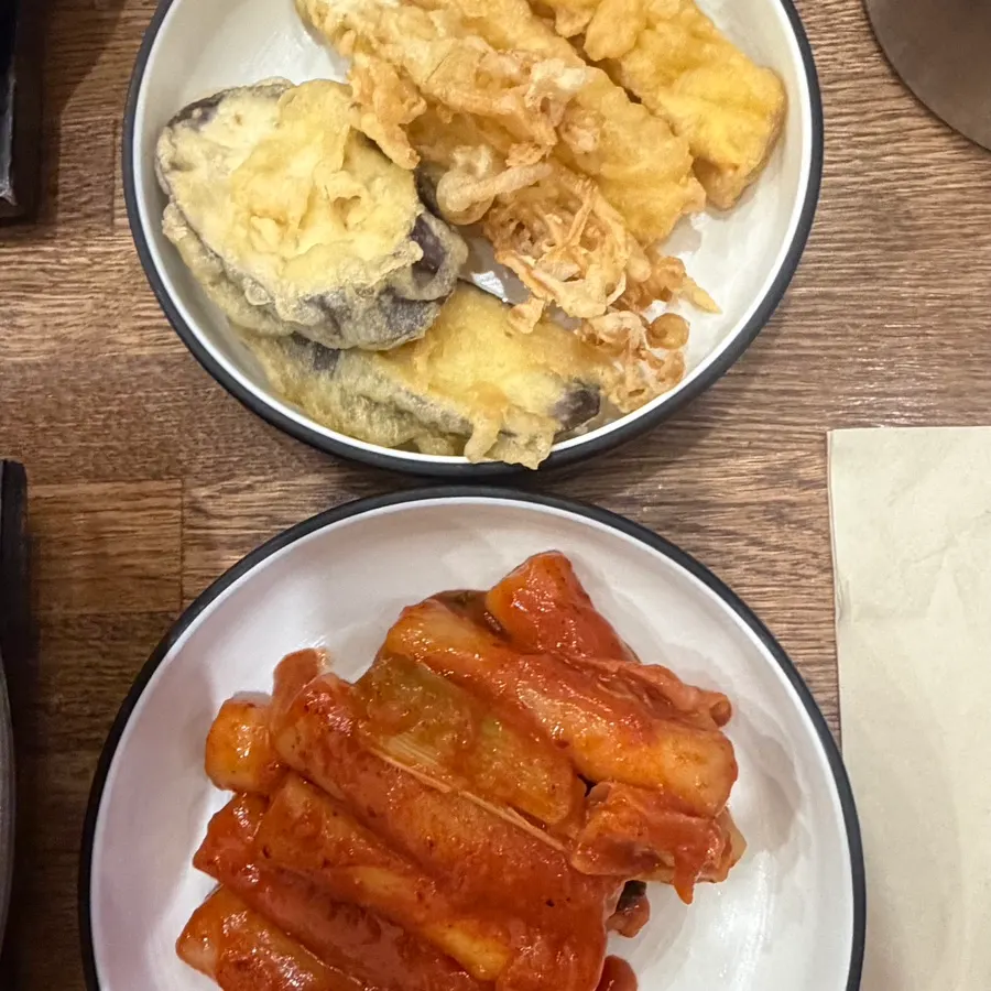 Tteokbokki, fried eggplant, and fried mushrooms at the self-serve bar