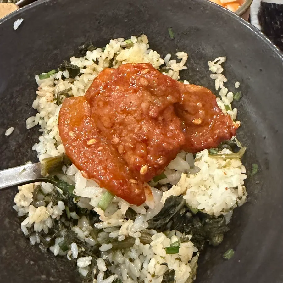 Gochujang bulgogi eaten with gondre sotbap
