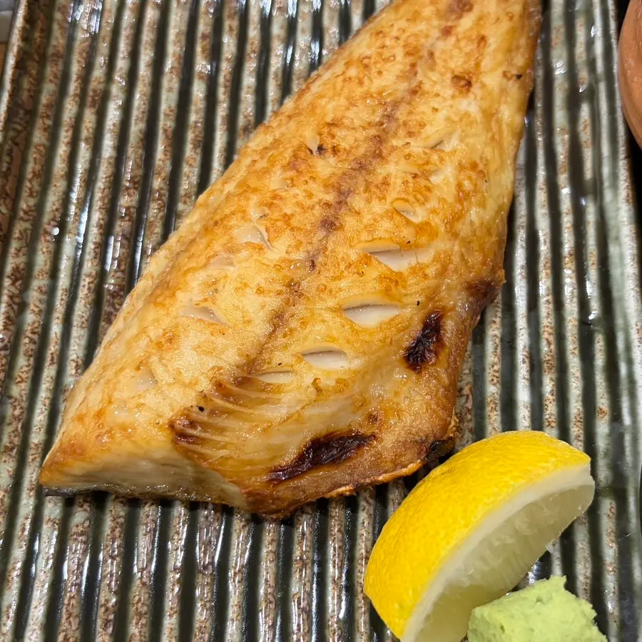 Grilled fish set served with roasted seaweed