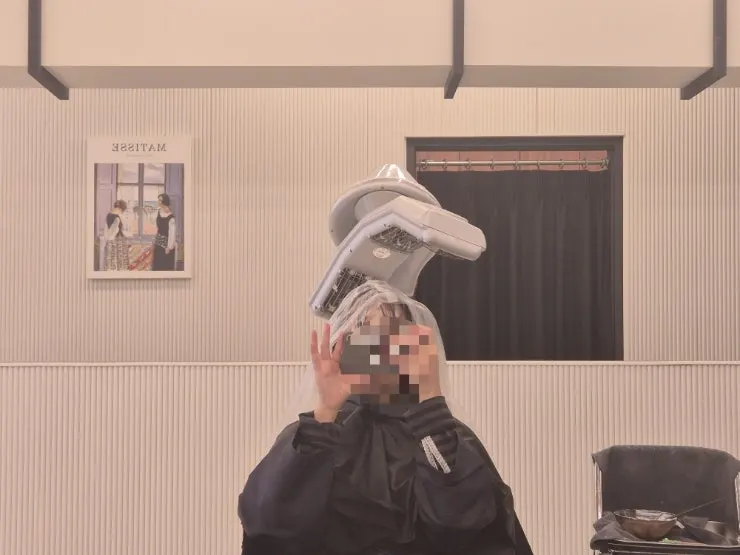 Treatment underway after consultation for magic straightening and C-curl perm