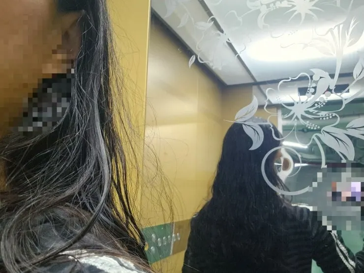 Hair treatment being carried out meticulously