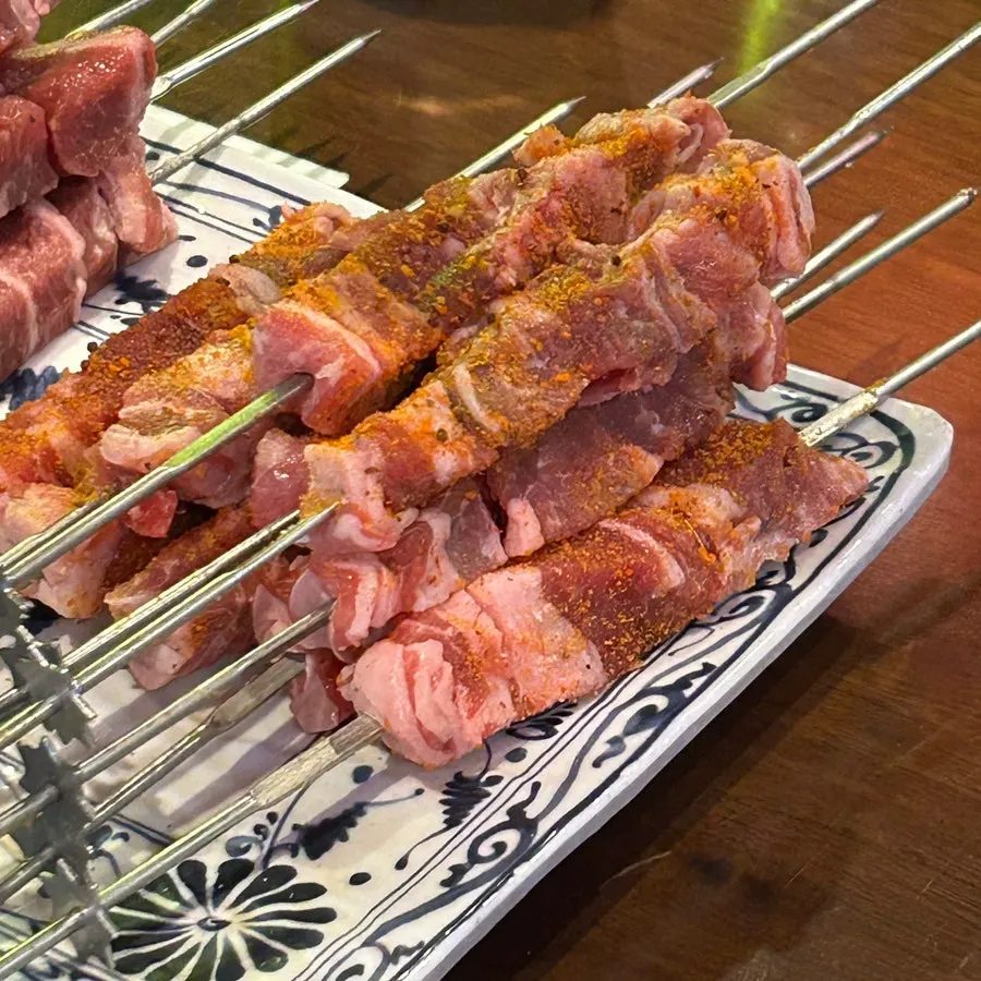 Original lamb skewers brushed with the special sauce