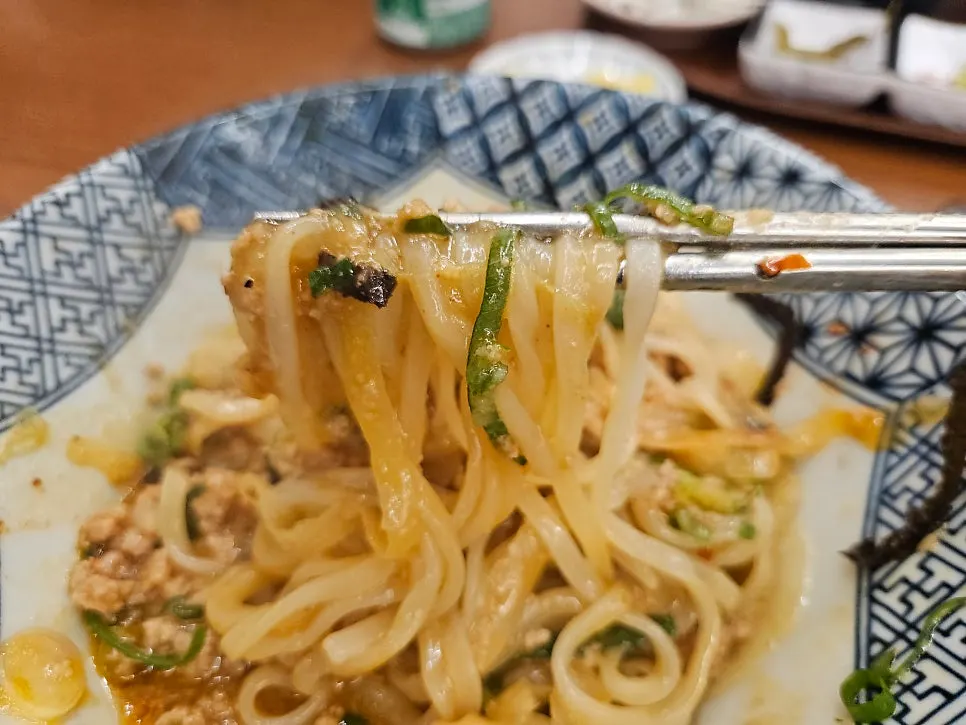 Close-up of mazesoba noodles coated in sauce