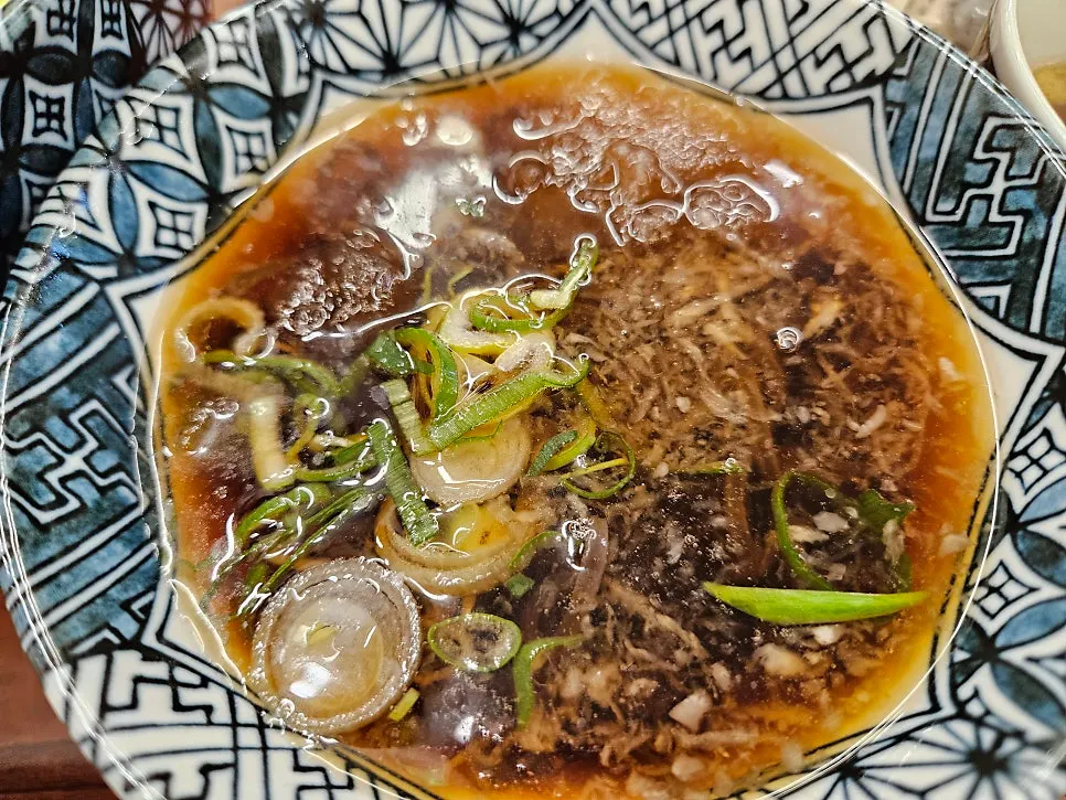 Close-up of smoky grilled pork butadon