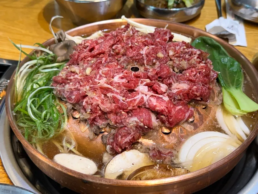 Bulgogi and vegetables cooking