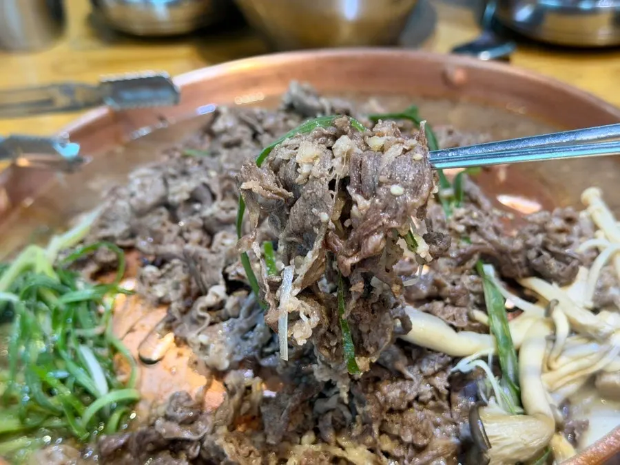 A piece of cooked Korean beef bulgogi