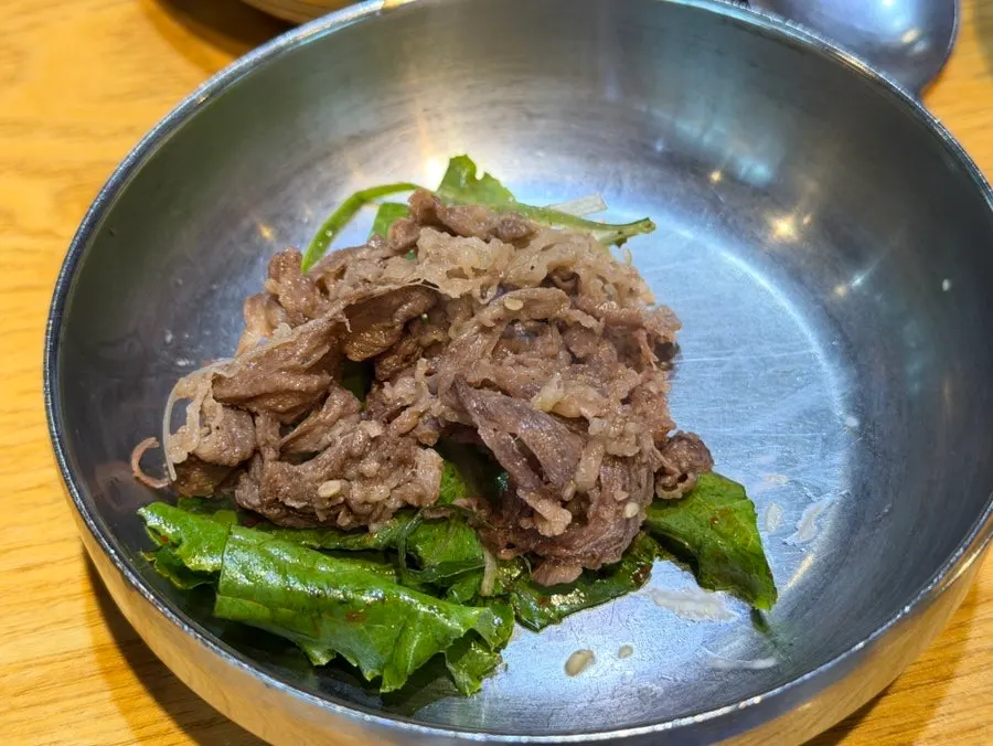 Bulgogi dipped in broth