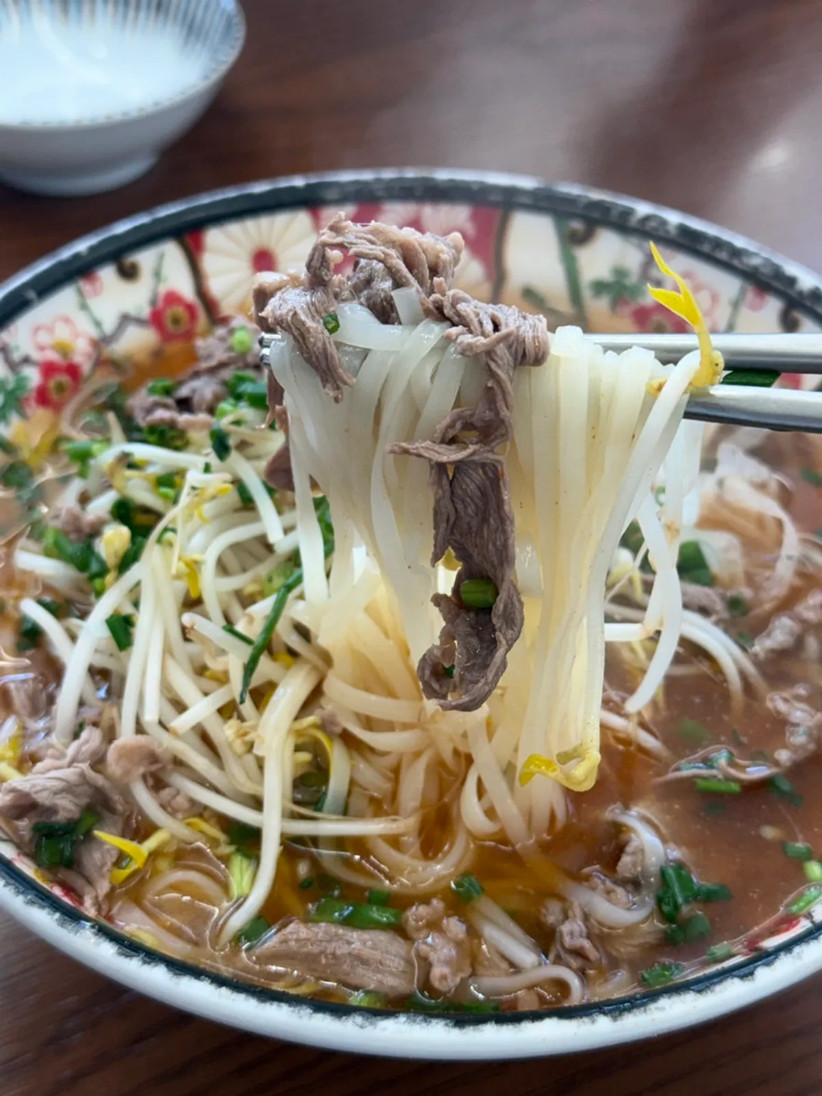A bowl of spicy shabu pho