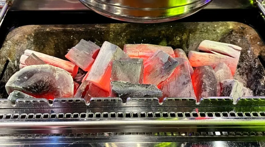 Lamb skewers on an automatic rotating grill