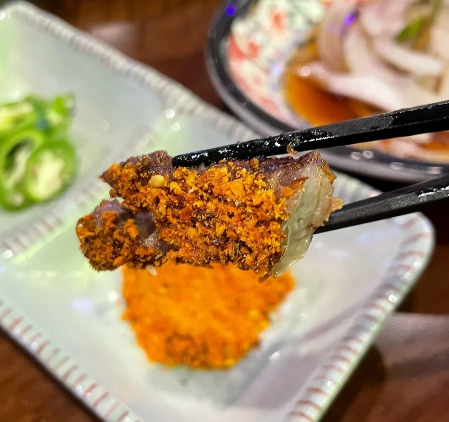 Lamb skewers grilling on the automatic grill