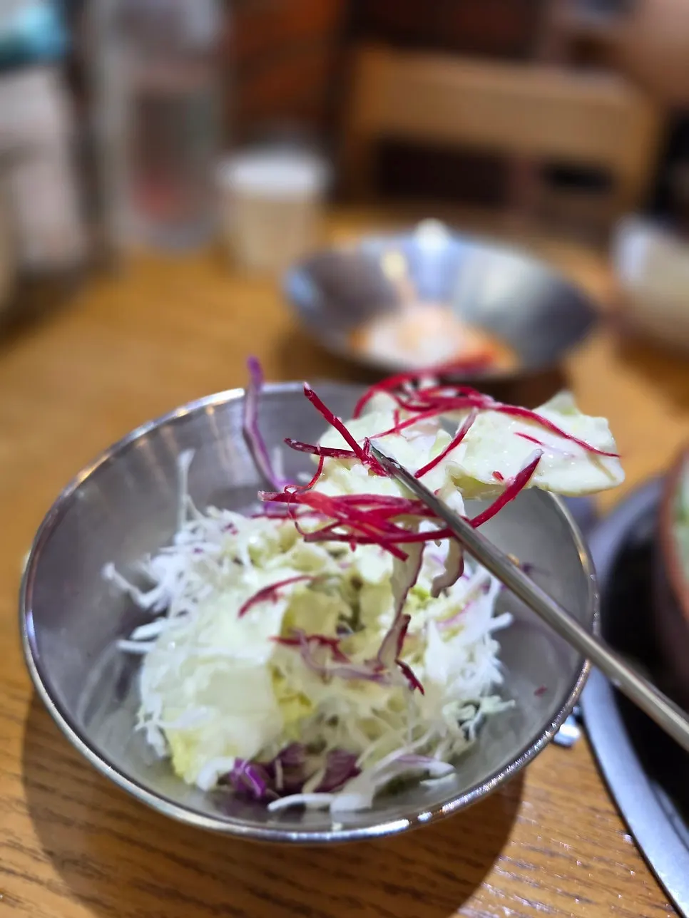 Warm japchae side dish served at the table