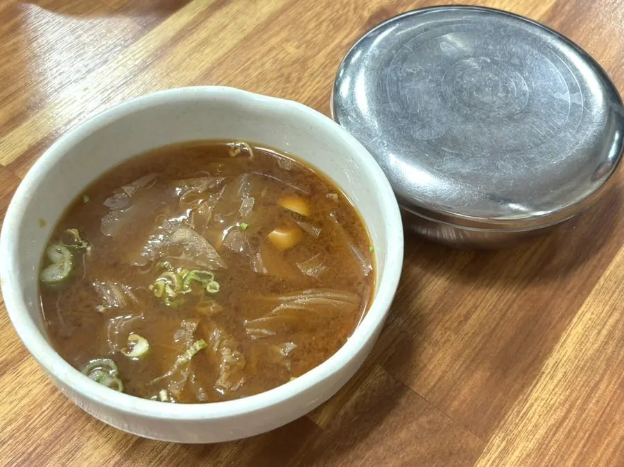 Bowl of rice served with doenjang soybean paste soup