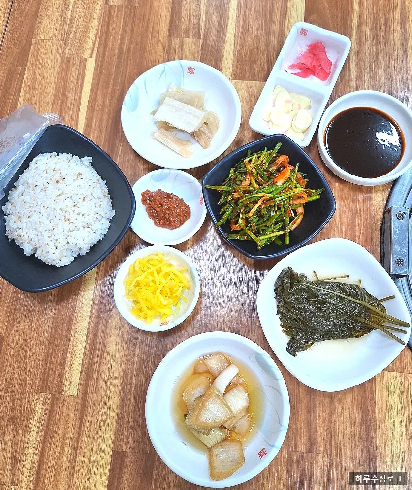 Side dish spread with sushi rice included