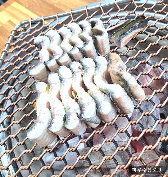 Eel grilling over charcoal