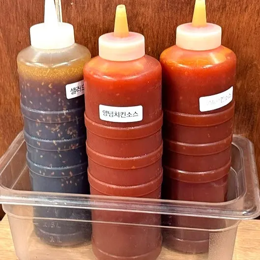 Self-serve bar with chicken and japchae