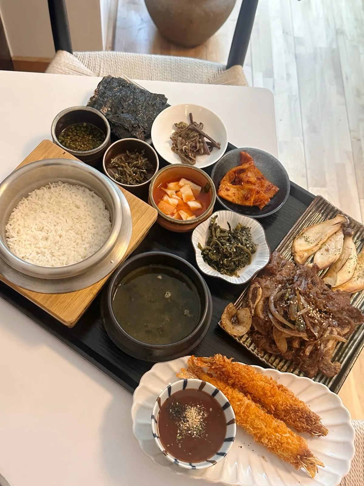 Side dishes and kimchi laid out at the Oneul Haru self-serve bar