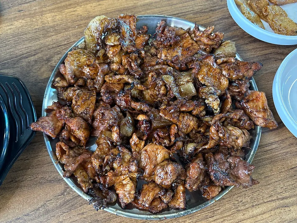 Gochujang pork grilled over charcoal