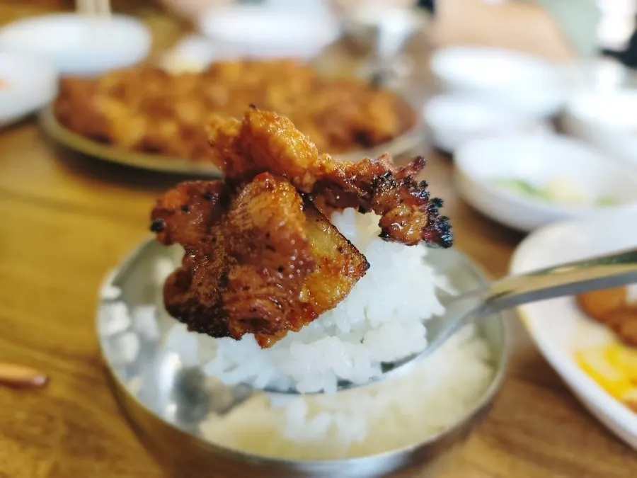Charcoal gochujang grilled pork with accompaniments