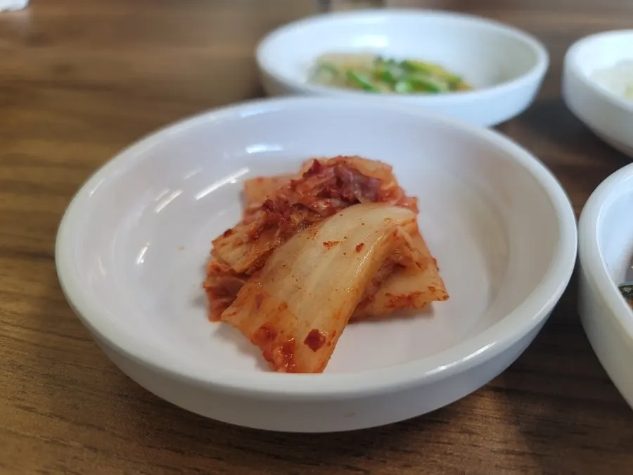 Napa cabbage kimchi side dish at Ttukbangjip