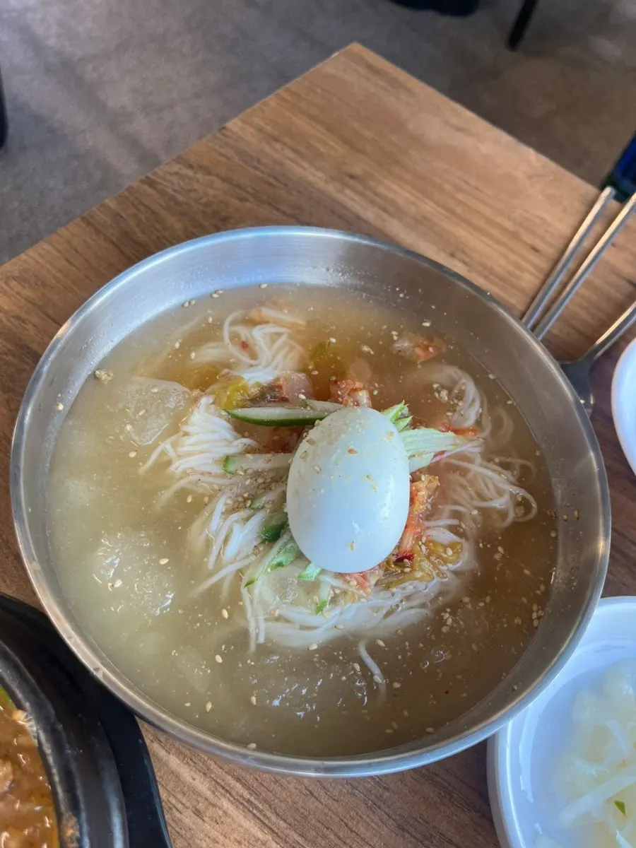 Ttukbangjip's kimchi-rolled noodles