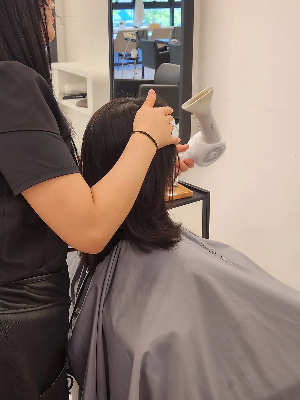 Medium-length C-curls coming alive while drying