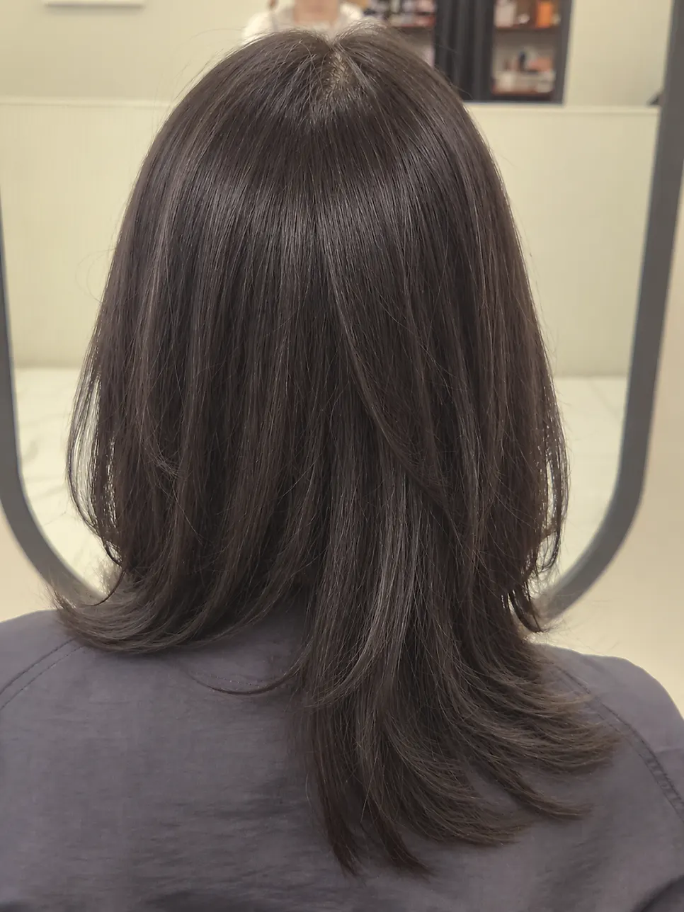 Finished layered medium-length C-curl perm