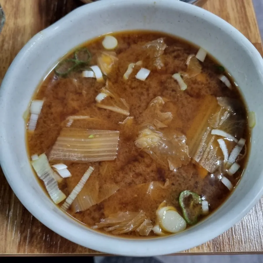 Soybean soup served alongside grilled eel