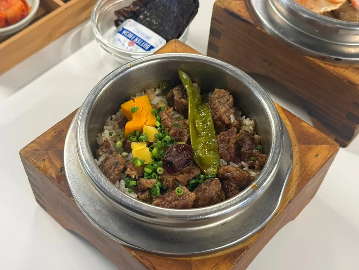 Steaming-hot pot rice served with butter