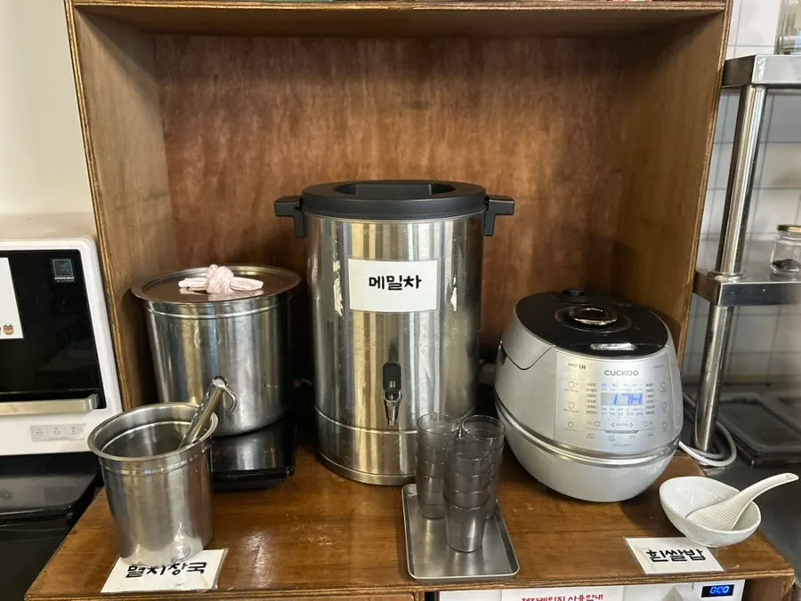 Self-serve refill bar with anchovy broth and buckwheat tea