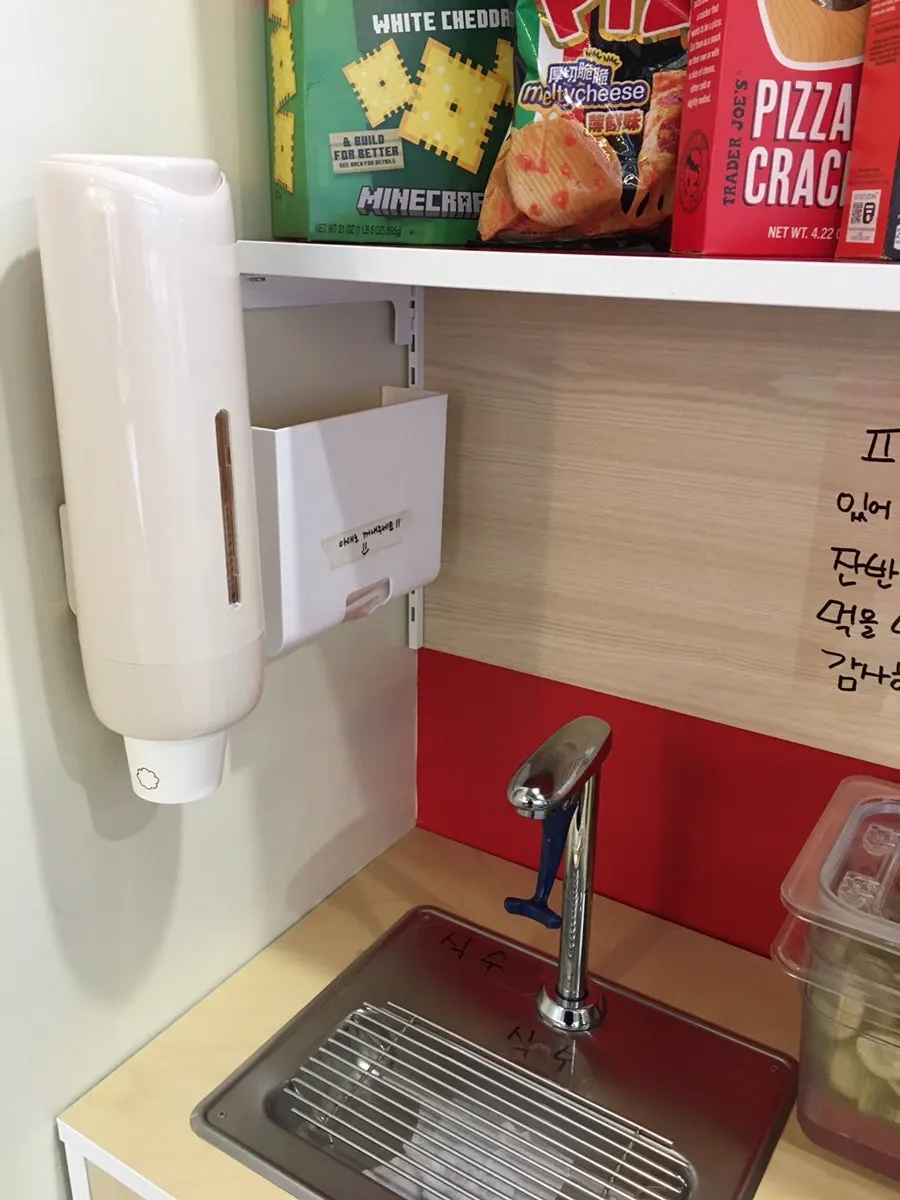 Self-serve bar stocked with pickles and cutlery
