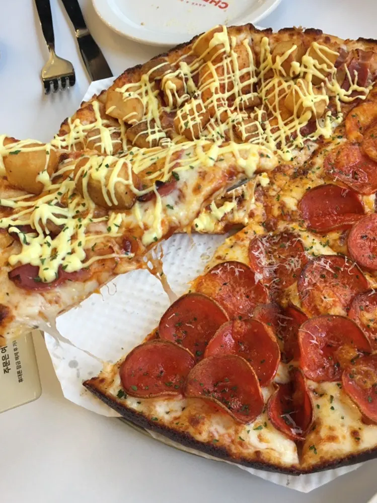 Freshly baked pizza piled high with toppings