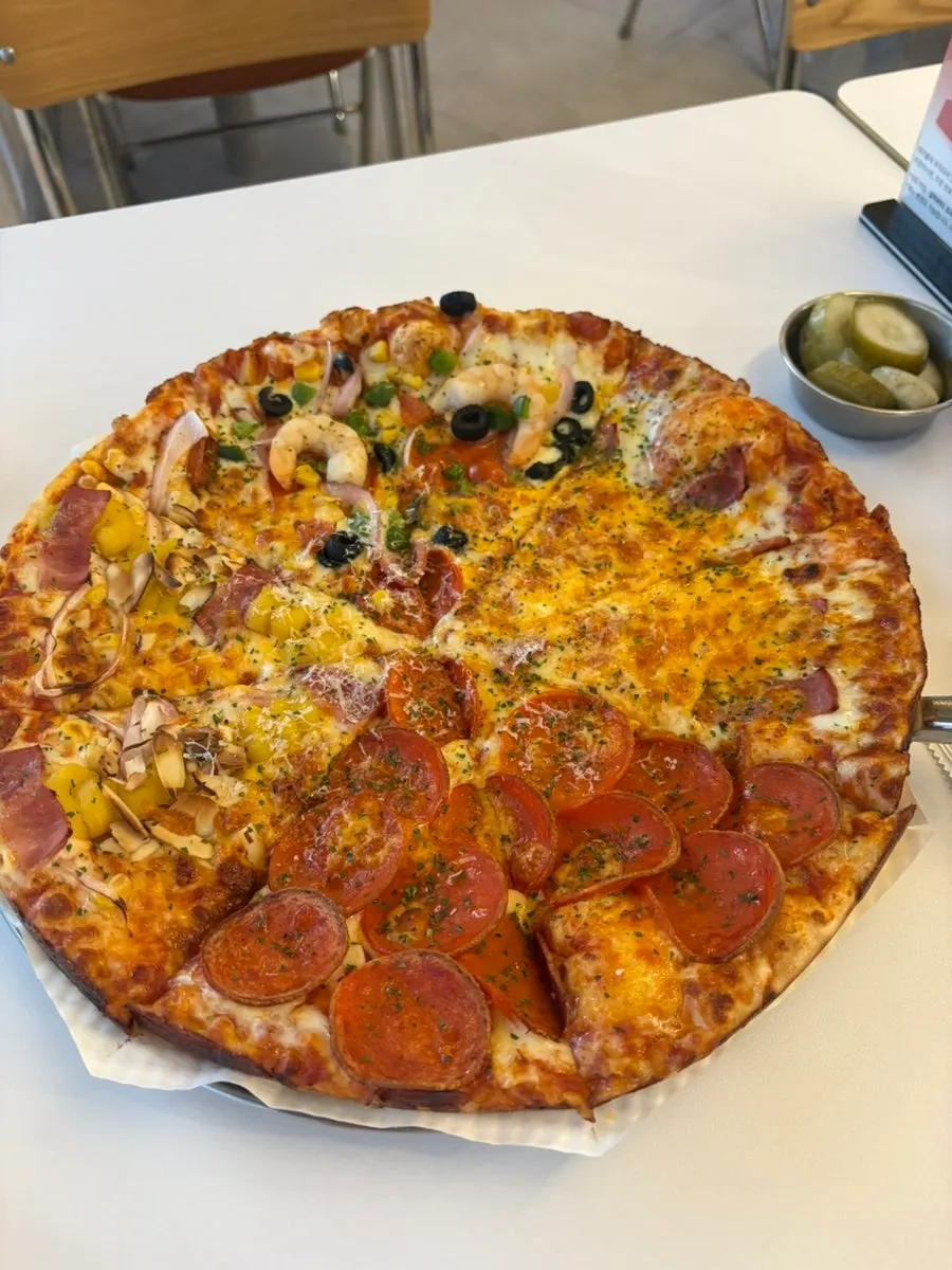 A whole Quattro Wave pizza loaded with toppings