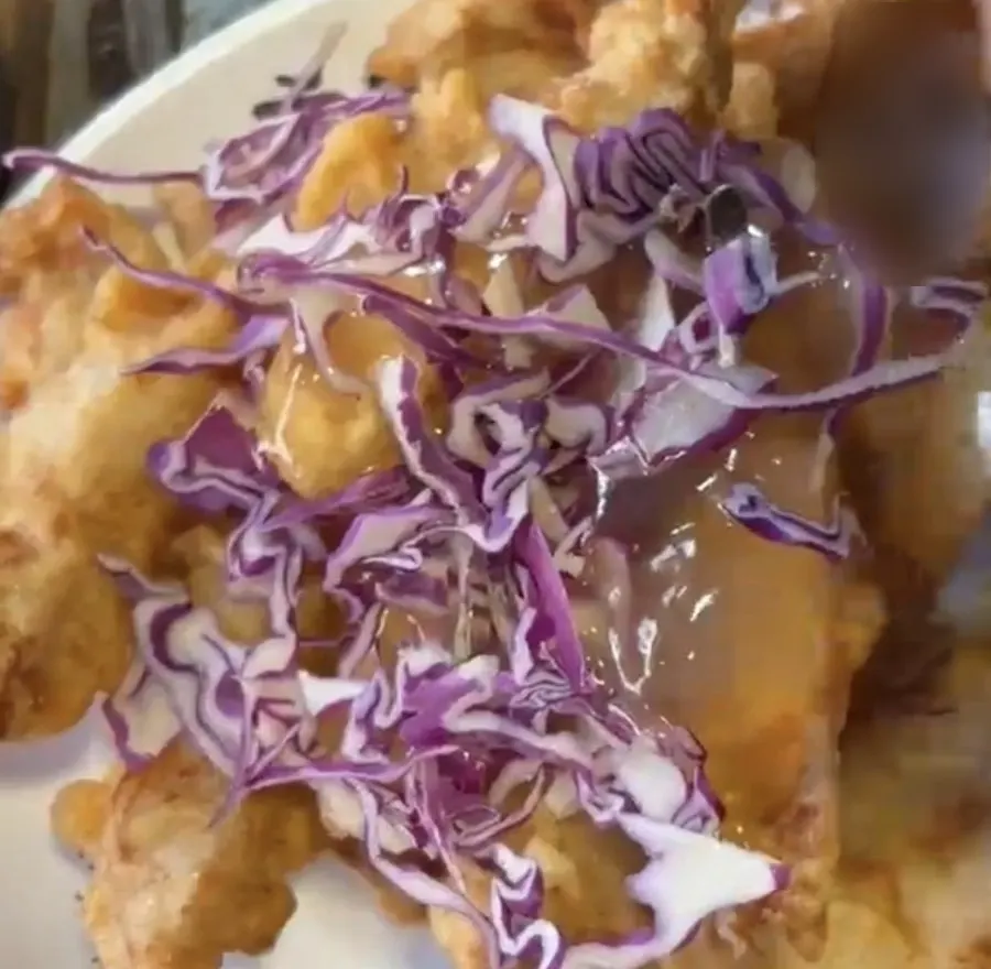 Mini glutinous sweet-and-sour pork with its sauce served on the side